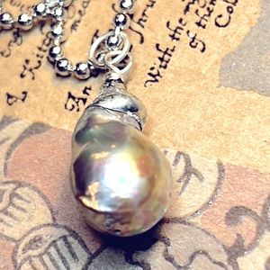 Beautiful Natural Pearl on daintiest 24” ballchain. This necklace sparkles!